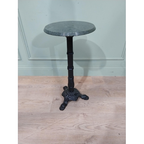 34 - Cast iron marble topped wine table. {70 cm H x 35 cm Dia.}.
