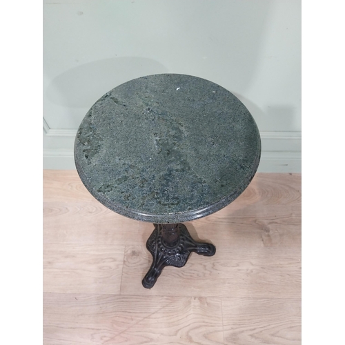 34 - Cast iron marble topped wine table. {70 cm H x 35 cm Dia.}.