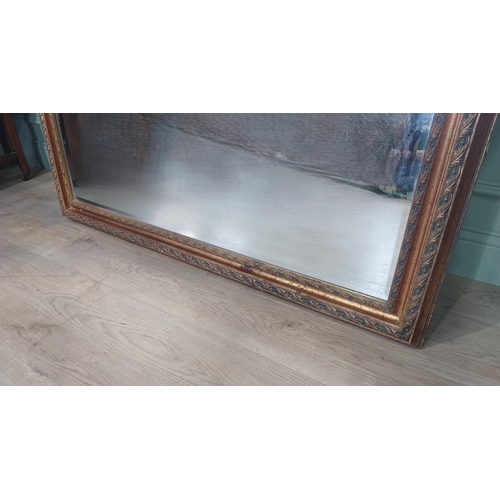 25 - Large gilt wall mirror in the Victorian style. {216 cm H x 140 cm W}.