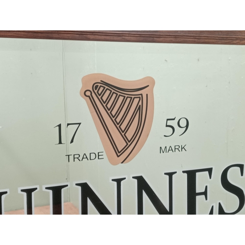 271 - Guinness Extra Stout framed bevelled advertising mirror. {H 96cm x W 127cm x D 3cm }