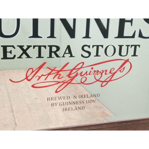 271 - Guinness Extra Stout framed bevelled advertising mirror. {H 96cm x W 127cm x D 3cm }