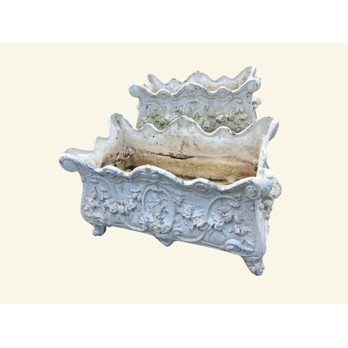 702 - Five metal planters in the Victorian style. {18 cm H x 50 cm W x 28 cm D}.