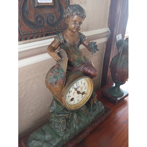 38 - 19th. C. three piece French cold painted spelter clock garniture raised on marble bases, the clock w... 