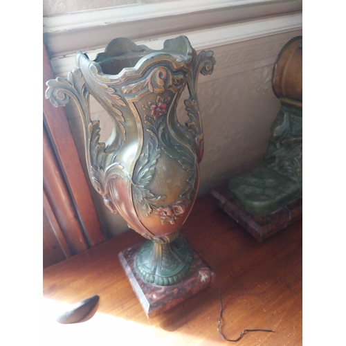 38 - 19th. C. three piece French cold painted spelter clock garniture raised on marble bases, the clock w... 