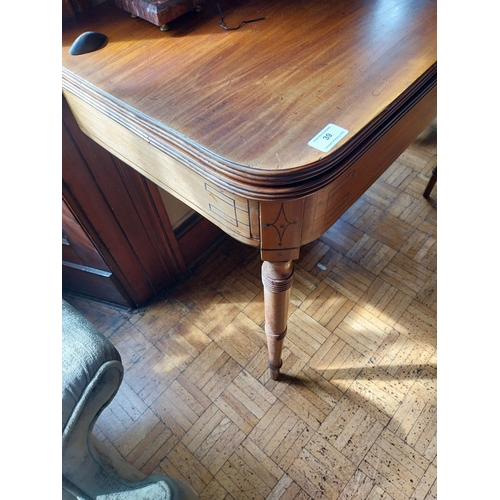 39 - 19th. C. inlaid mahogany turn over leaf tea table, raised on turned tapered legs, in the Georgian ma... 
