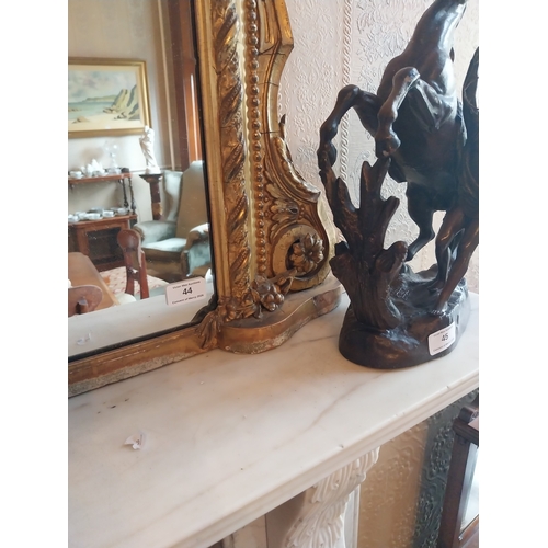44 - Good quality 19th. C. giltwood overmantel, decorated with foliage and surmounted with pierced lattic... 