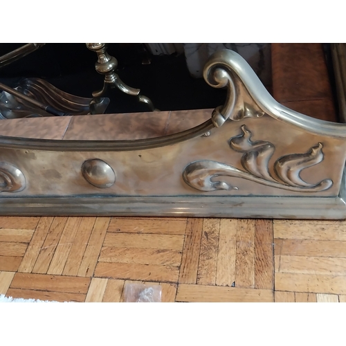 51 - Art Nouveau brass fire fender.  { 24cm H X 141cm L X 32cm D }.