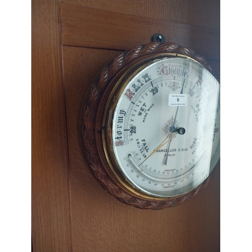 6 - 19th. C. carved oak circular barometer, made by Chancellor & Son Dublin. { 37cm Dia }