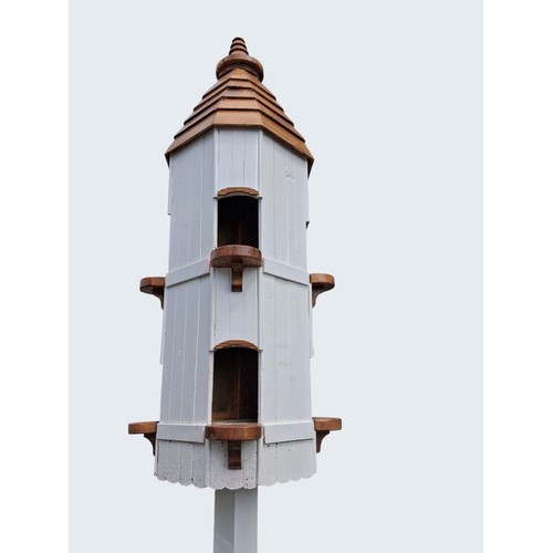 12 - Wooden painted Dovecote. {495 cm H x 125 cm W x 135 cm D} approx.