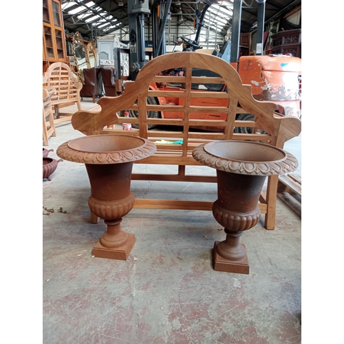 23 - Pair of cast iron Victorian urns.  {H 60c x Dia 47cm}. NOT ON SITE FOR VIEWING