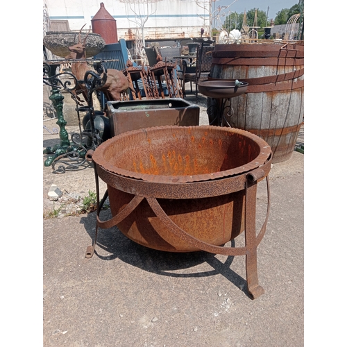 33 - Cast iron cauldron on three leg scroll base.  {H 46cm x Dia 70cm}. NOT ON SITE FOR VIEWING