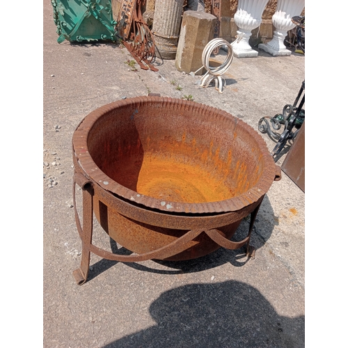 33 - Cast iron cauldron on three leg scroll base.  {H 46cm x Dia 70cm}. NOT ON SITE FOR VIEWING
