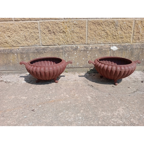 39 - Pair of cast iron fluted planters.  {H 17cm x W 42cm x D 32cm}. NOT ON SITE FOR VIEWING