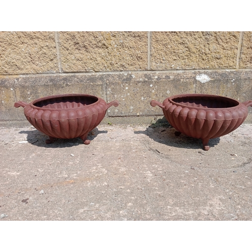 39 - Pair of cast iron fluted planters.  {H 17cm x W 42cm x D 32cm}. NOT ON SITE FOR VIEWING