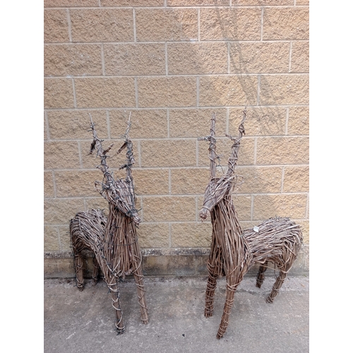 49 - Pair of Stags made from willow.  {H 137cm x W 27cm x D 70cm}. NOT ON SITE FOR VIEWING