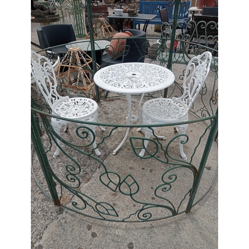 53 - Wrought iron Italian gazebo with scroll and floral decoration.  {H 260cm x W 187cm}. NOT ON SITE FOR... 