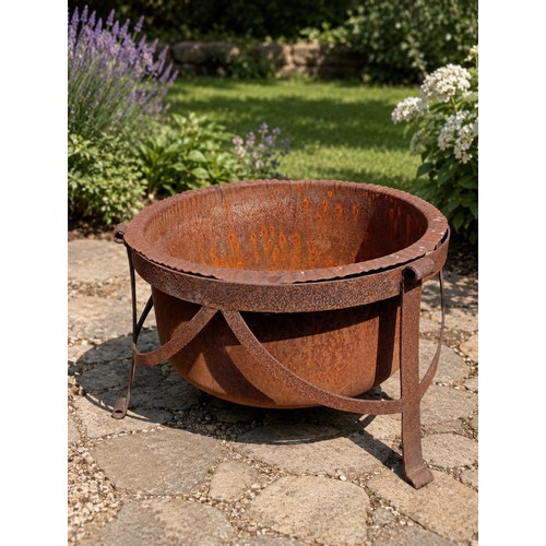 33 - Cast iron cauldron on three leg scroll base.  {H 46cm x Dia 70cm}. NOT ON SITE FOR VIEWING