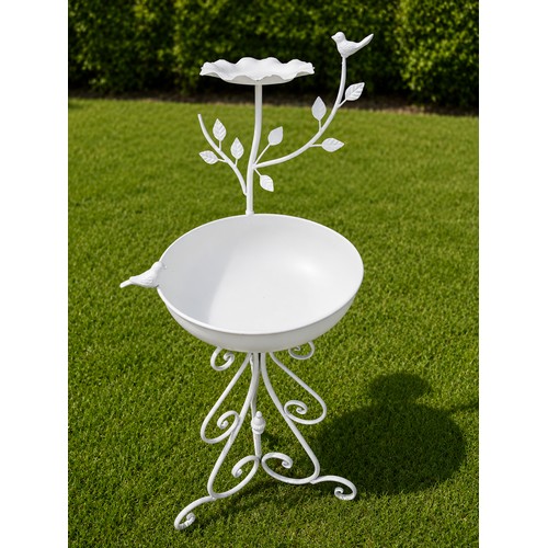 35 - Wrought iron bird bath decorated with birds on three scrolled legs.  {H 90cm x Dia 37cm}. NOT ON SIT... 