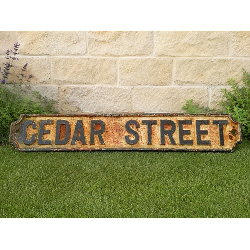 41 - Cedar Street cast iron street sign. {H 18cm x W 102cm}. NOT ON SITE FOR VIEWING