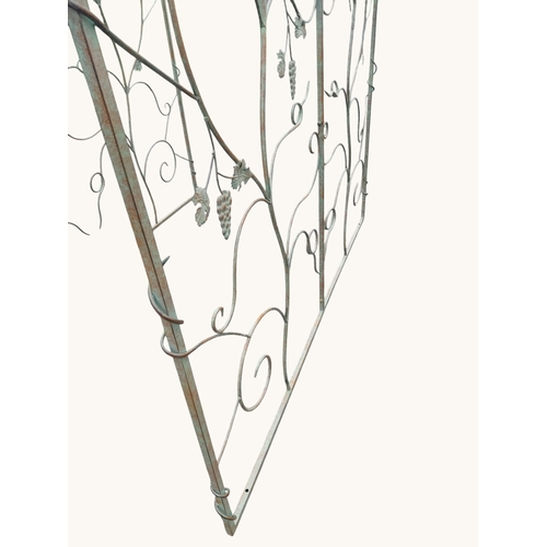 2 - Bronzed metal rose walk decorated with grapes and vine leaves. {231 cm H x 120 cm W x 201 cm D}.