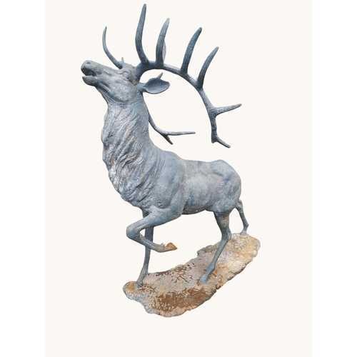 44 - Lead effect cast iron model of bellowing Stag on plinth. {174 cm H x 124 cm W x 90 cm D}.