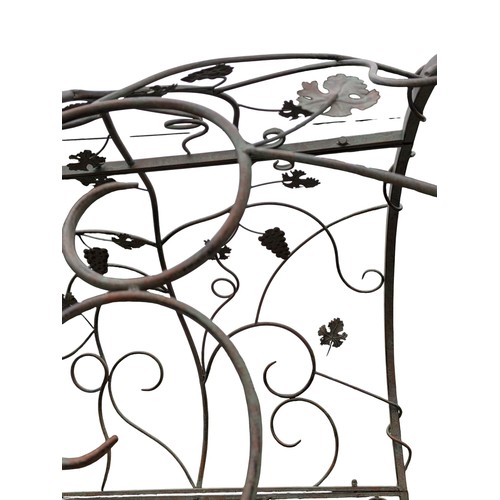 2 - Bronzed metal rose walk decorated with grapes and vine leaves. {231 cm H x 120 cm W x 201 cm D}.