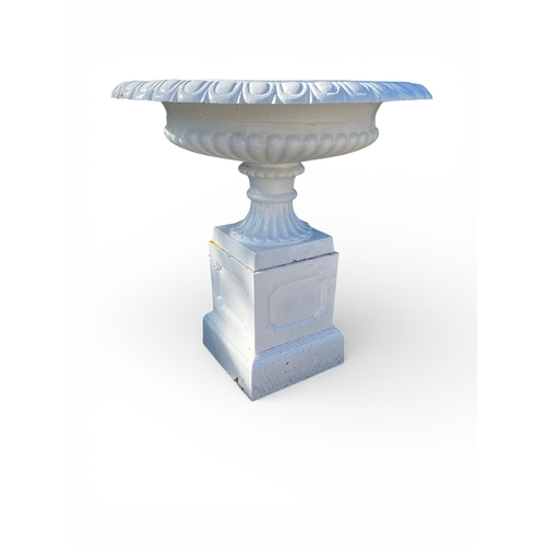 9 - Pair of cast iron urns in the Georgian manner {95cm H x 901cm Dia.} (Plants not included)