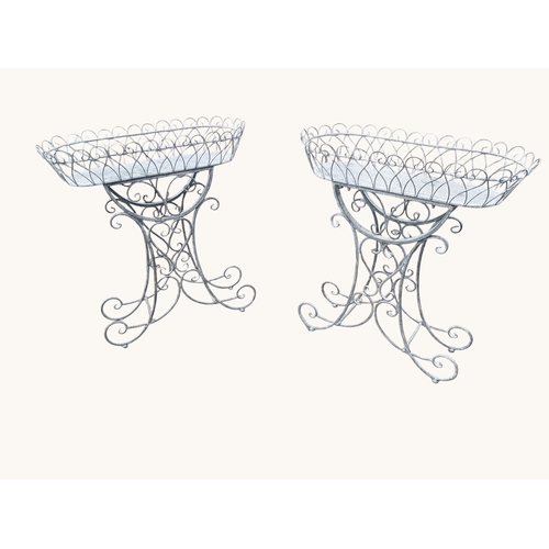 5 - Pair of lead effect planters in the French style. {70 cm H x 64 cm W x 27 cm D}. (Plants not include... 
