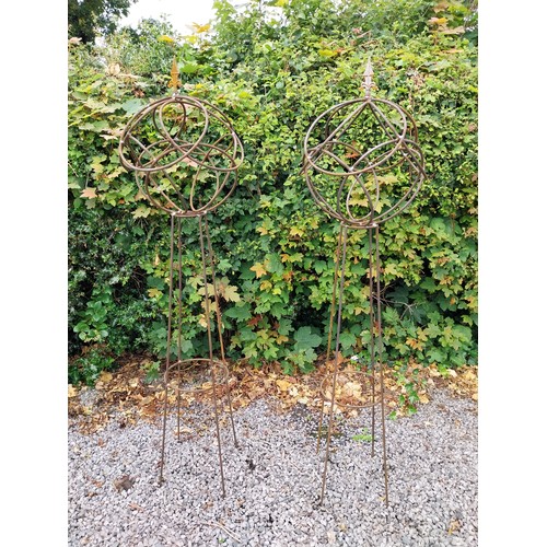 6 - Pair of wrought iron obelisks with sphere top and pointed finials. {158 cm H x 40 cm Dia.}.