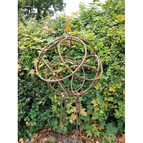 6 - Pair of wrought iron obelisks with sphere top and pointed finials. {158 cm H x 40 cm Dia.}.