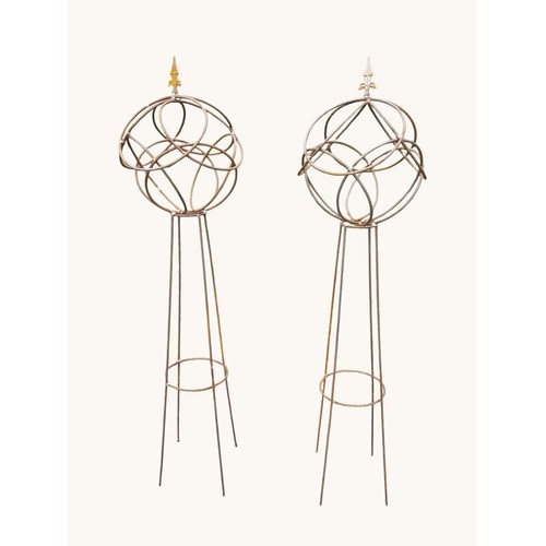 6 - Pair of wrought iron obelisks with sphere top and pointed finials. {158 cm H x 40 cm Dia.}.