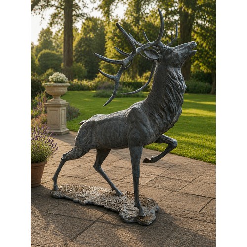 44 - Lead effect cast iron model of bellowing Stag on plinth. {174 cm H x 124 cm W x 90 cm D}.