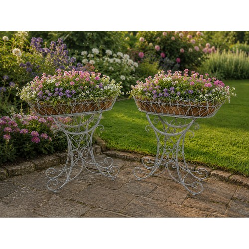 5 - Pair of lead effect planters in the French style. {70 cm H x 64 cm W x 27 cm D}. (Plants not include... 