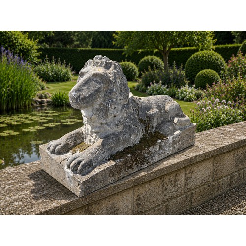 8 - 19th C. weathered compositon model of recumbent Lion. {79 cm H x 150 cm W x 62 cm D}.