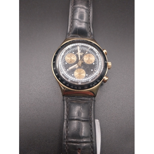 1 - Swatch Irony Men's watch with leather strap.
