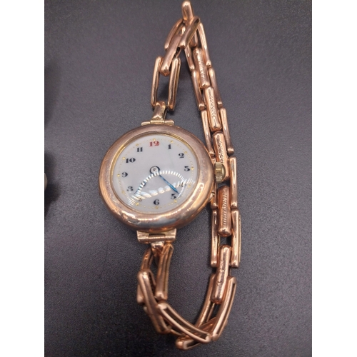 11 - Two gold metal Ladies watches.