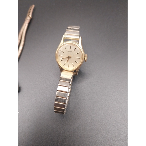 13 - Two gold metal Ladies watches.