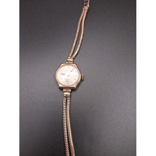 13 - Two gold metal Ladies watches.
