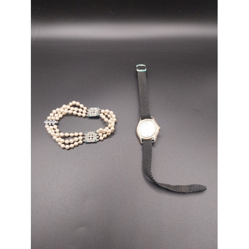 14 - Faux Ladies bracelet and Ladies watch with leather strap.