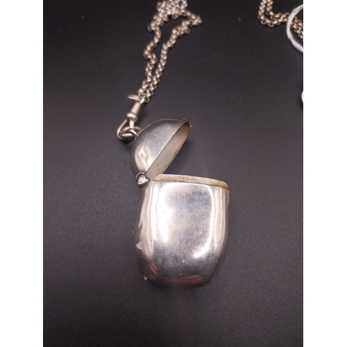 18 - Silver match strike on chain. Hallmarked Silver. 35 cm L. Wt: 30 grms.