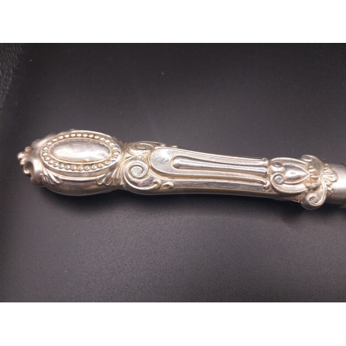 24 - Stamped silver Fish serving fork. { 25cm L }. Wt: 115.8 grms.
