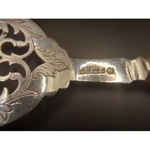 24 - Stamped silver Fish serving fork. { 25cm L }. Wt: 115.8 grms.
