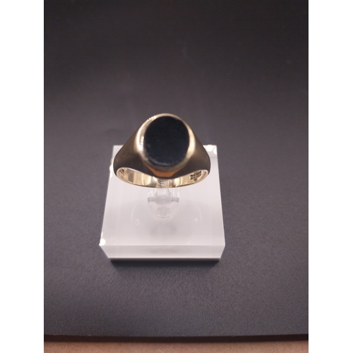 27 - 9 ct gold monogrammed Gent's signet ring - J.M . Size X. Wt: 5.7 grms.