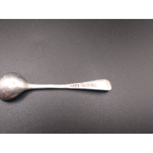 42 - Four silver salt pots with spoons. Hallmarked in London. Wt: 72.7 grms in total.