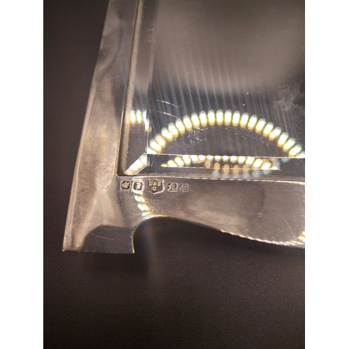 43 - Hallmarked Silver framed mirror.  {23 cm H x 16 cm W} .