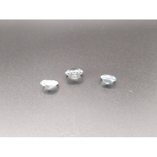 60 - Three loose aquamarine stones.  1.75 ct and 2 x 2.5 ct. Wt:  1.8 grms in total.