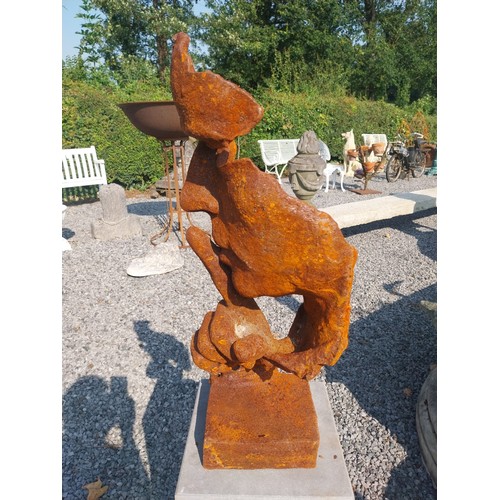 1 - Cast iron contemporary Speak No Evil sculpture on slate pedestal. {139 cm H x 26 cm W x 26 cm D}.