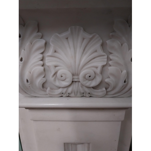 3 - Irish William IV statutory Carrera marble fire surround decorated with carved shell and acanthus lea... 