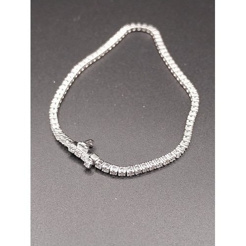 4 - Lab grown 3 ct diamond and 18 ct white gold tennis bracelet. 7.09grms.