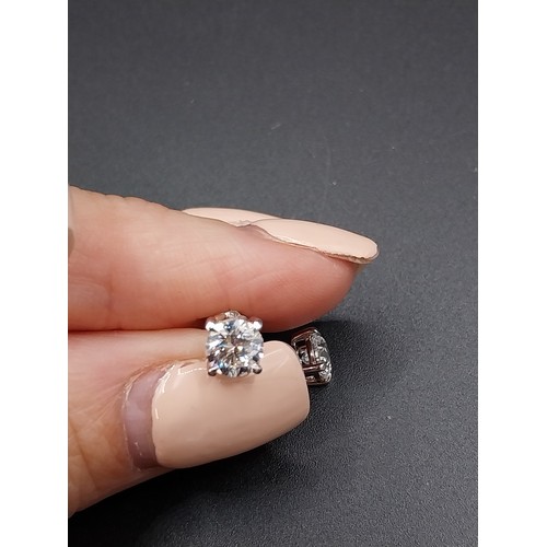 6 - Lab grown 1.59 ct diamond and 18 ct white gold four prong stud earrings.